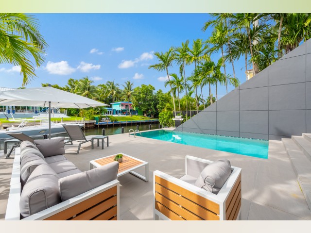 Biscayne Bay Modernist 3-Story Waterfront Villa with Private Lift, Gym & Deep-Water Jetty